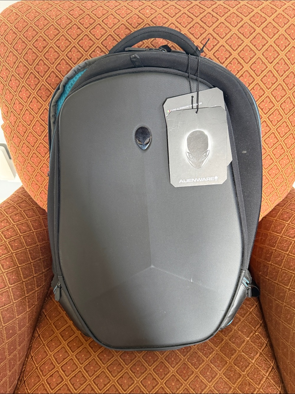 Alienware Matte Black Hard-Shell Backpack with Subtle Teal Accents